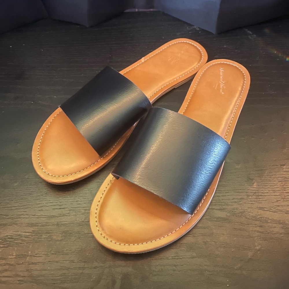 Black and brown slip on sandals